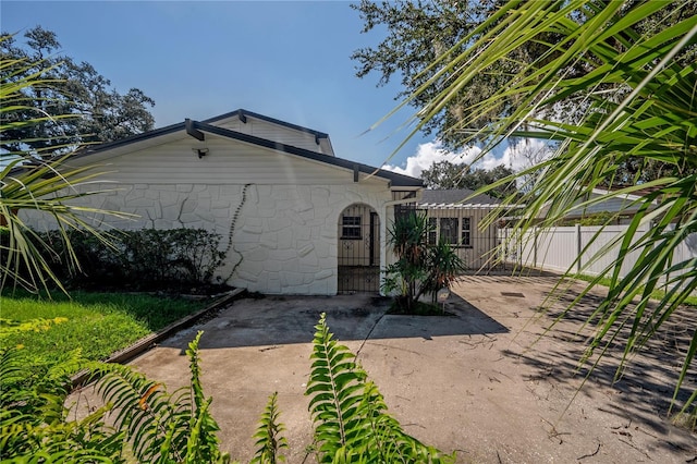 back of house featuring a patio