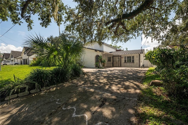 exterior space featuring a front lawn