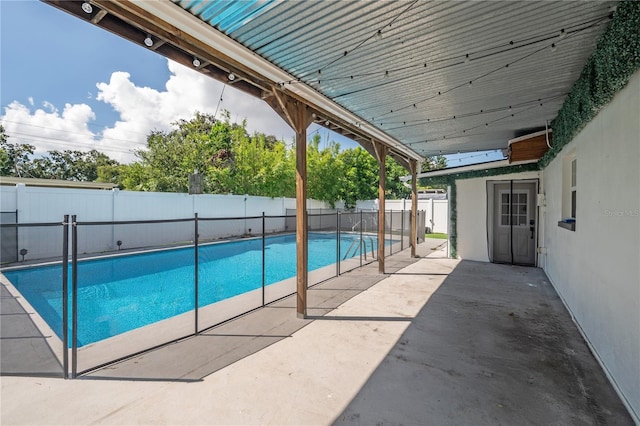 view of pool featuring a patio