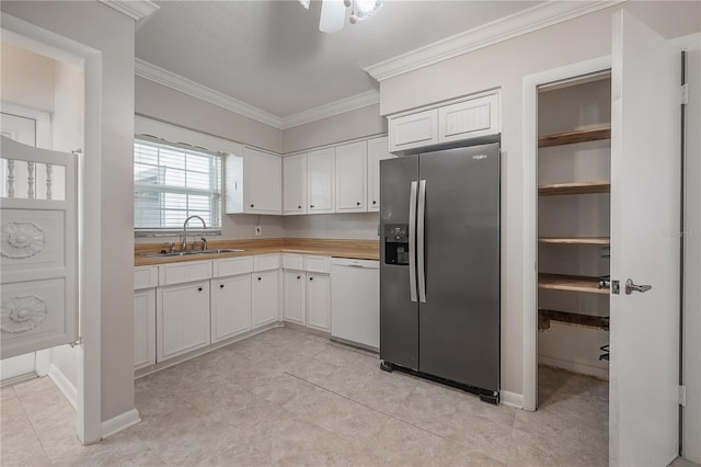 kitchen featuring sink, crown molding, dishwasher, stainless steel refrigerator with ice dispenser, and white cabinets