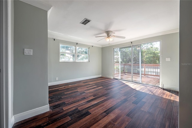 unfurnished room with ornamental molding, dark hardwood / wood-style floors, and ceiling fan