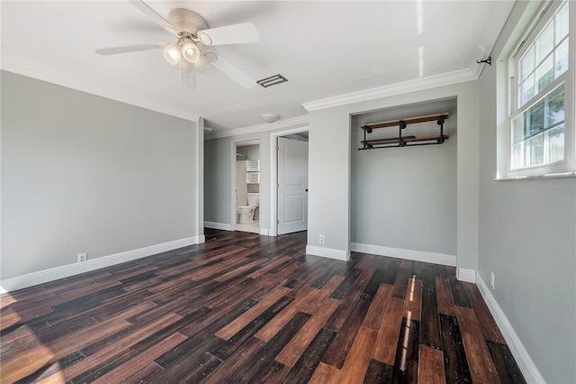 unfurnished bedroom with dark wood-type flooring, ceiling fan, and ornamental molding