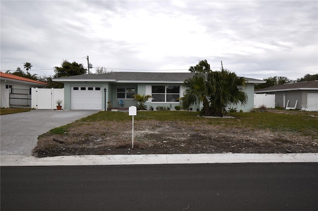 single story home featuring a garage