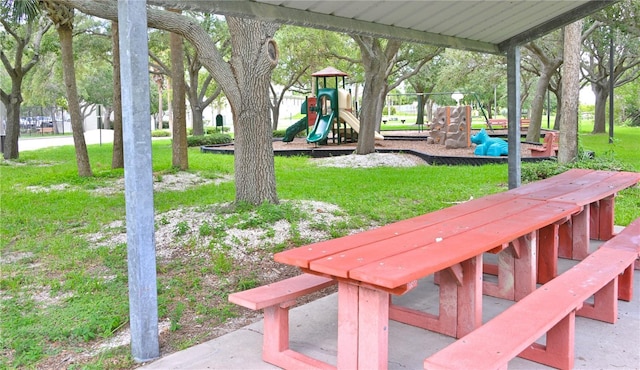 exterior space featuring a lawn and a playground