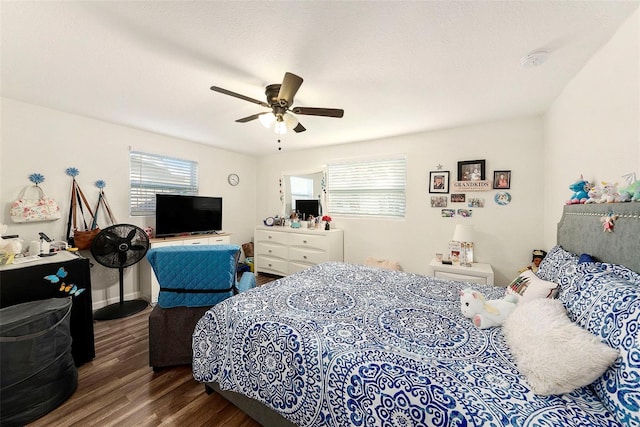 bedroom featuring hardwood / wood-style floors and ceiling fan