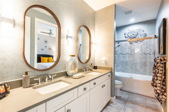 full bathroom featuring ceiling fan, shower / bathtub combination with curtain, tile patterned flooring, toilet, and vanity