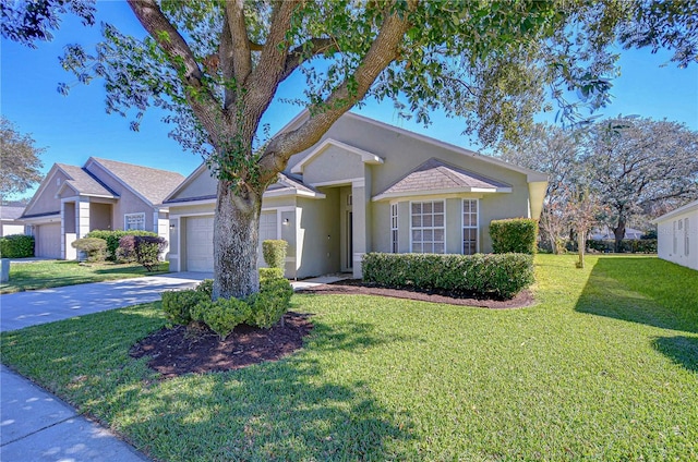 ranch-style home featuring a front lawn and a garage