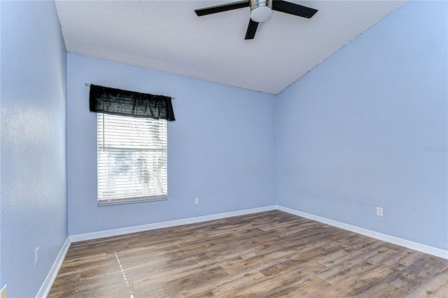 unfurnished room featuring ceiling fan, a textured ceiling, and hardwood / wood-style flooring