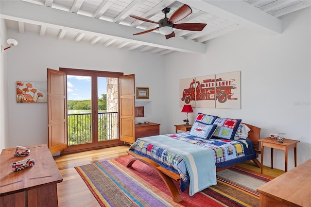 bedroom with ceiling fan, beam ceiling, access to outside, and light hardwood / wood-style flooring