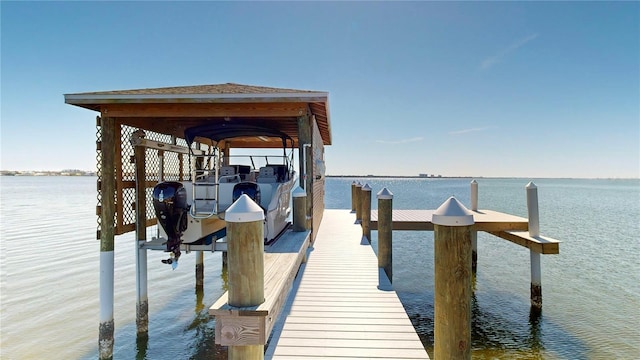 view of dock with a water view