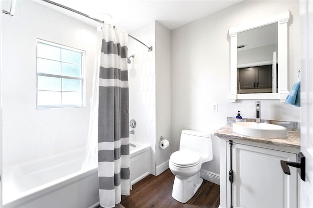 full bathroom with shower / tub combo with curtain, vanity, hardwood / wood-style flooring, and toilet