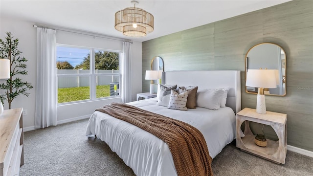 bedroom featuring carpet flooring and multiple windows