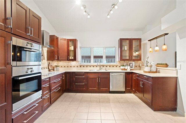 8701 Ballantrae Way, Tampa, FL 33647 - kitchen with appliances with stainless steel finishes, sink, pendant lighting, and decorative backsplash