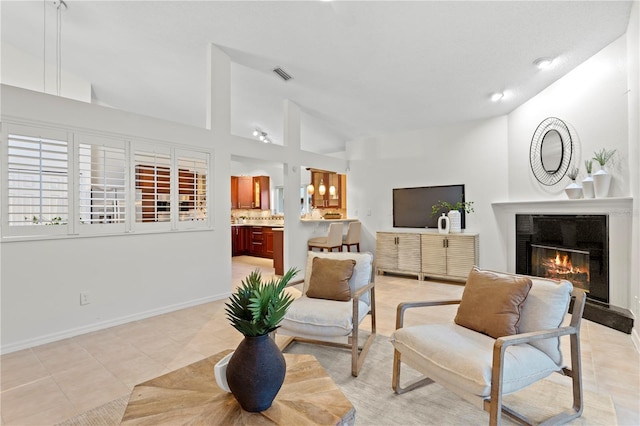 8701 Ballantrae Way, Tampa, FL 33647 - living room with light tile patterned flooring and high vaulted ceiling
