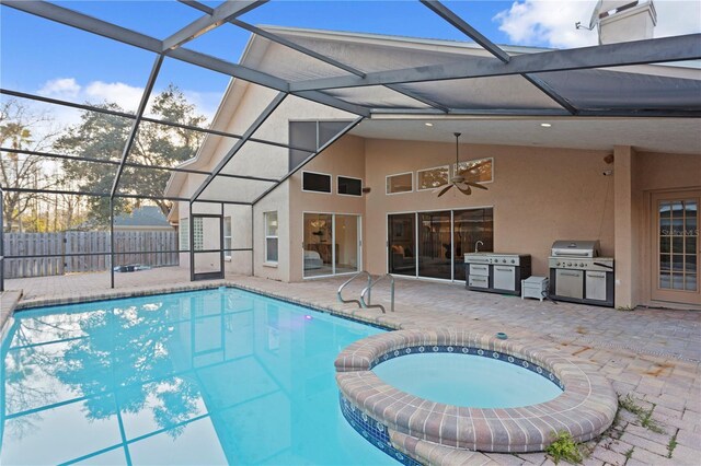 8701 Ballantrae Way, Tampa, FL 33647 - view of pool with an in ground hot tub, grilling area, a patio, and glass enclosure
