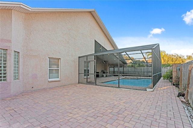 8701 Ballantrae Way, Tampa, FL 33647 - view of swimming pool featuring a patio, a lanai, and ceiling fan