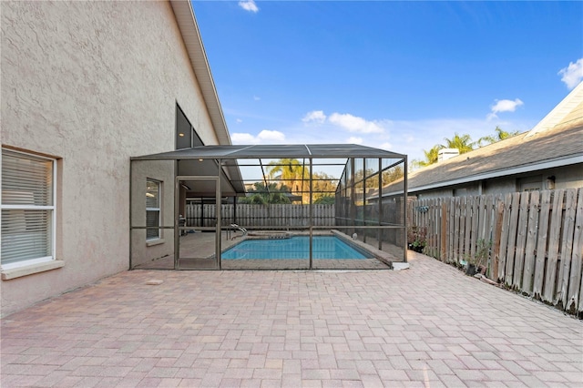 8701 Ballantrae Way, Tampa, FL 33647 - view of pool featuring a lanai and a patio
