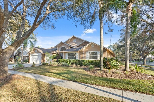 8701 Ballantrae Way, Tampa, FL 33647 - view of front of property featuring a garage and a front yard