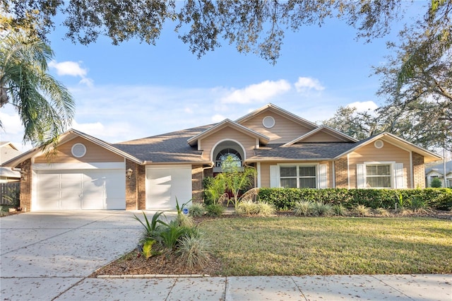8701 Ballantrae Way, Tampa, FL 33647 - ranch-style house featuring a garage and a front yard