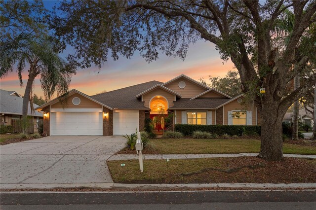 8701 Ballantrae Way, Tampa, FL 33647 - single story home with a yard and a garage