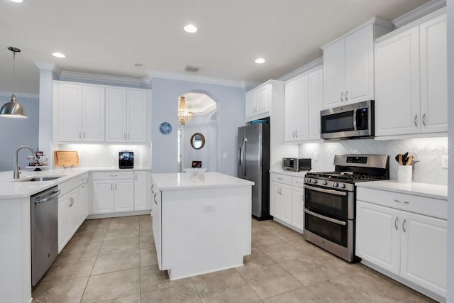 kitchen featuring white cabinets, sink, and stainless steel appliances