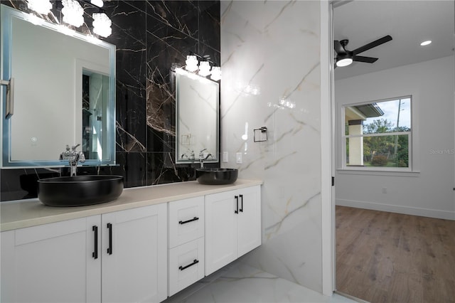 bathroom featuring double vanity, a ceiling fan, a sink, and recessed lighting