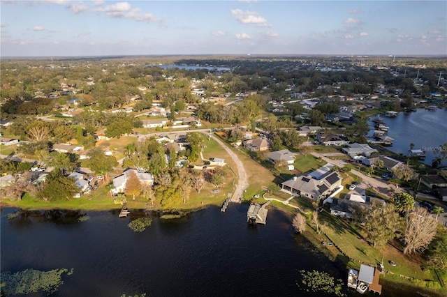 aerial view featuring a water view and a residential view