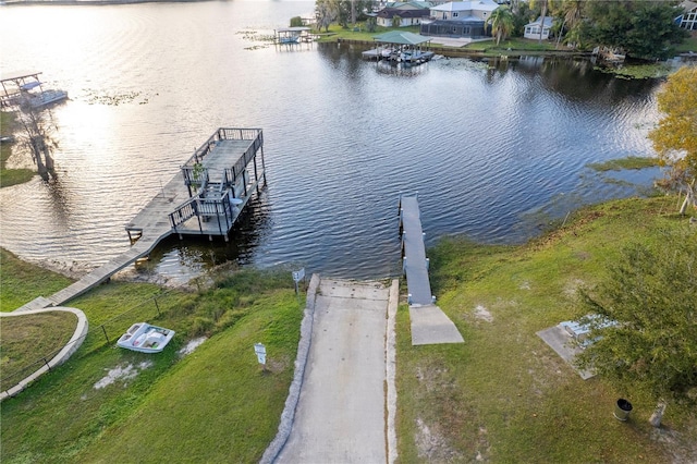 bird's eye view with a water view