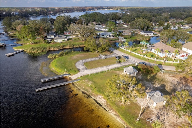 aerial view featuring a residential view and a water view