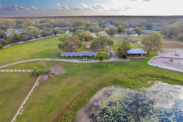 birds eye view of property with a rural view