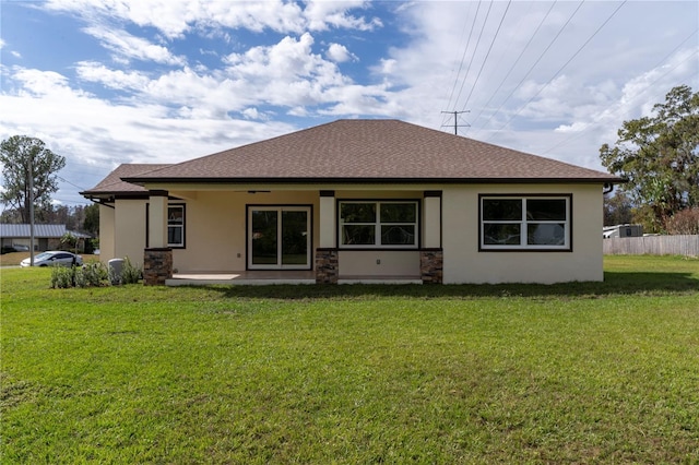 2972 Lake Saxon Dr, Land O Lakes, FL 34639 - back of house with stucco siding, a shingled roof, and a patio area