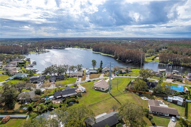 2972 Lake Saxon Dr, Land O Lakes, FL 34639 - view of property location featuring a large body of water, a forest, and nearby suburban area