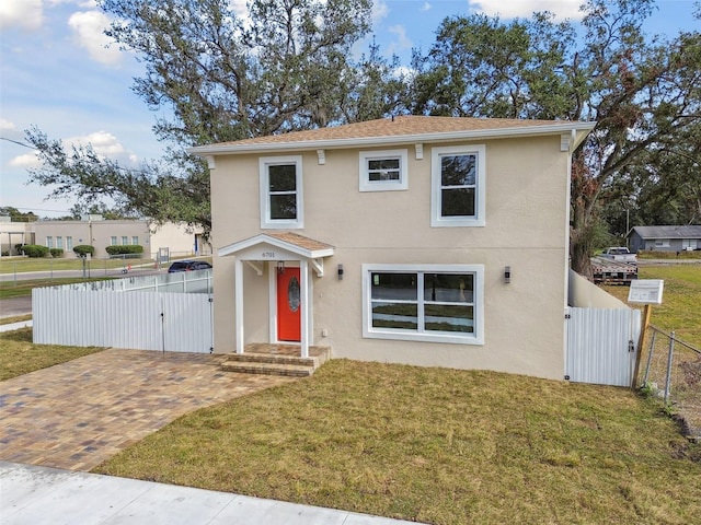 front of property with a front lawn