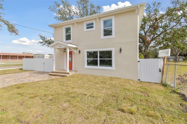 front facade with a front yard