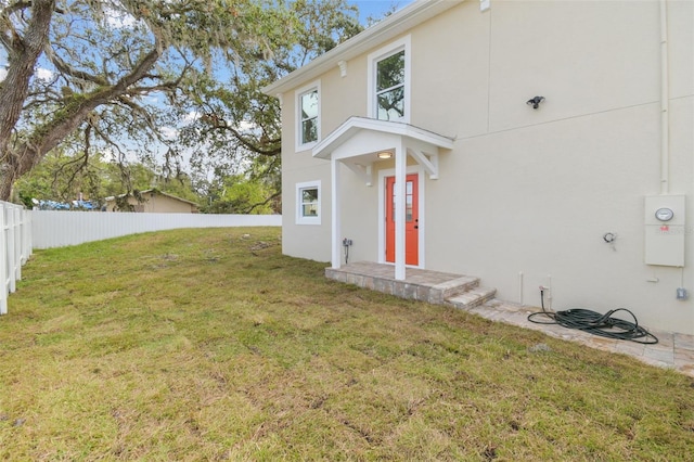 exterior space with a lawn