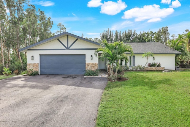 ranch-style house with a front yard and a garage