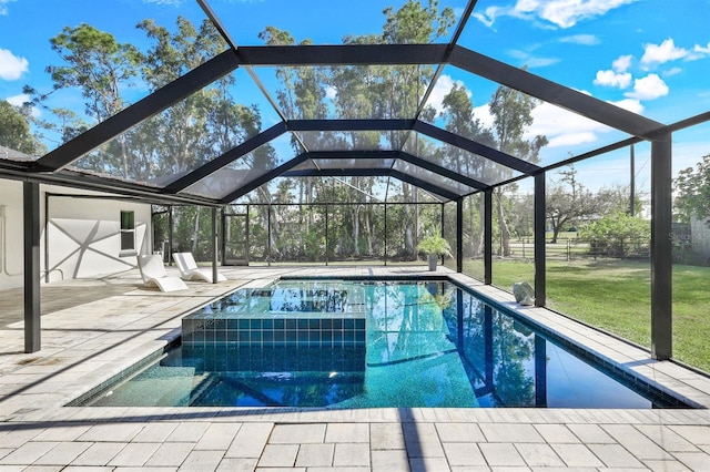 view of swimming pool featuring a patio area, a yard, and glass enclosure