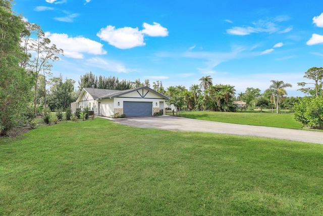 ranch-style house with a front yard and a garage