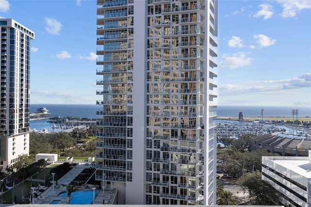 view of building exterior with a water view