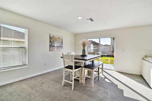 view of carpeted dining room