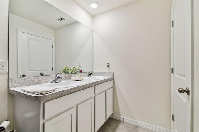 bathroom featuring vanity and tile patterned floors