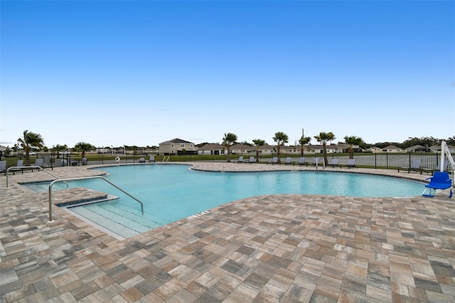 view of pool featuring a patio