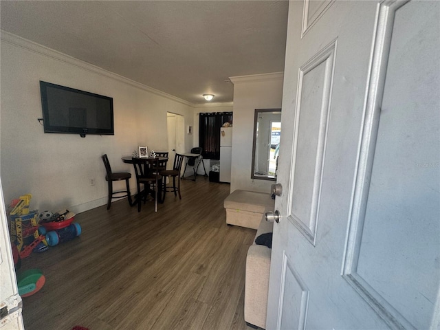 interior space with crown molding and dark wood-type flooring