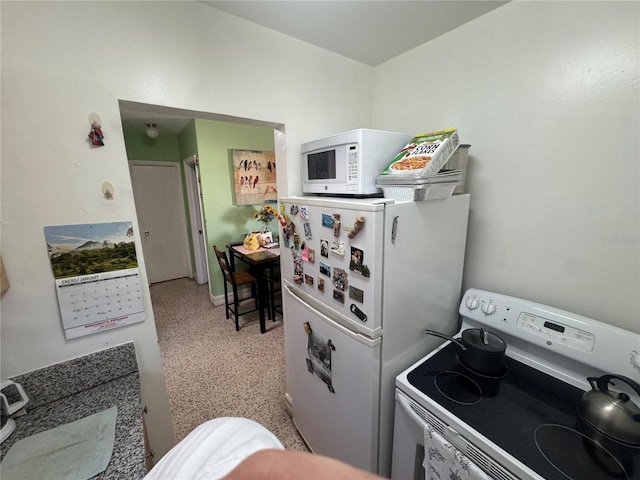 kitchen featuring white appliances