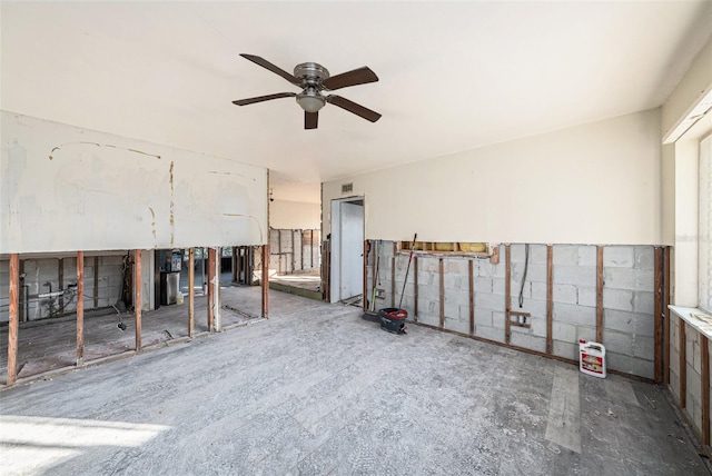 basement with ceiling fan