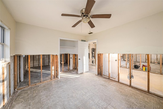 unfurnished room featuring ceiling fan