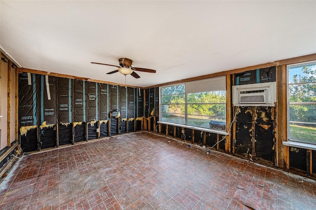 miscellaneous room with ceiling fan and cooling unit