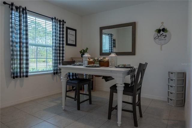 dining room with light tile patterned floors