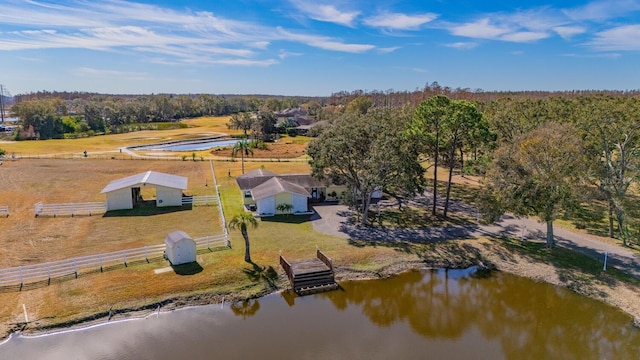 aerial view with a water view and a rural view