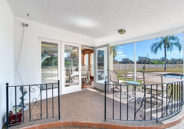 sunroom featuring a healthy amount of sunlight